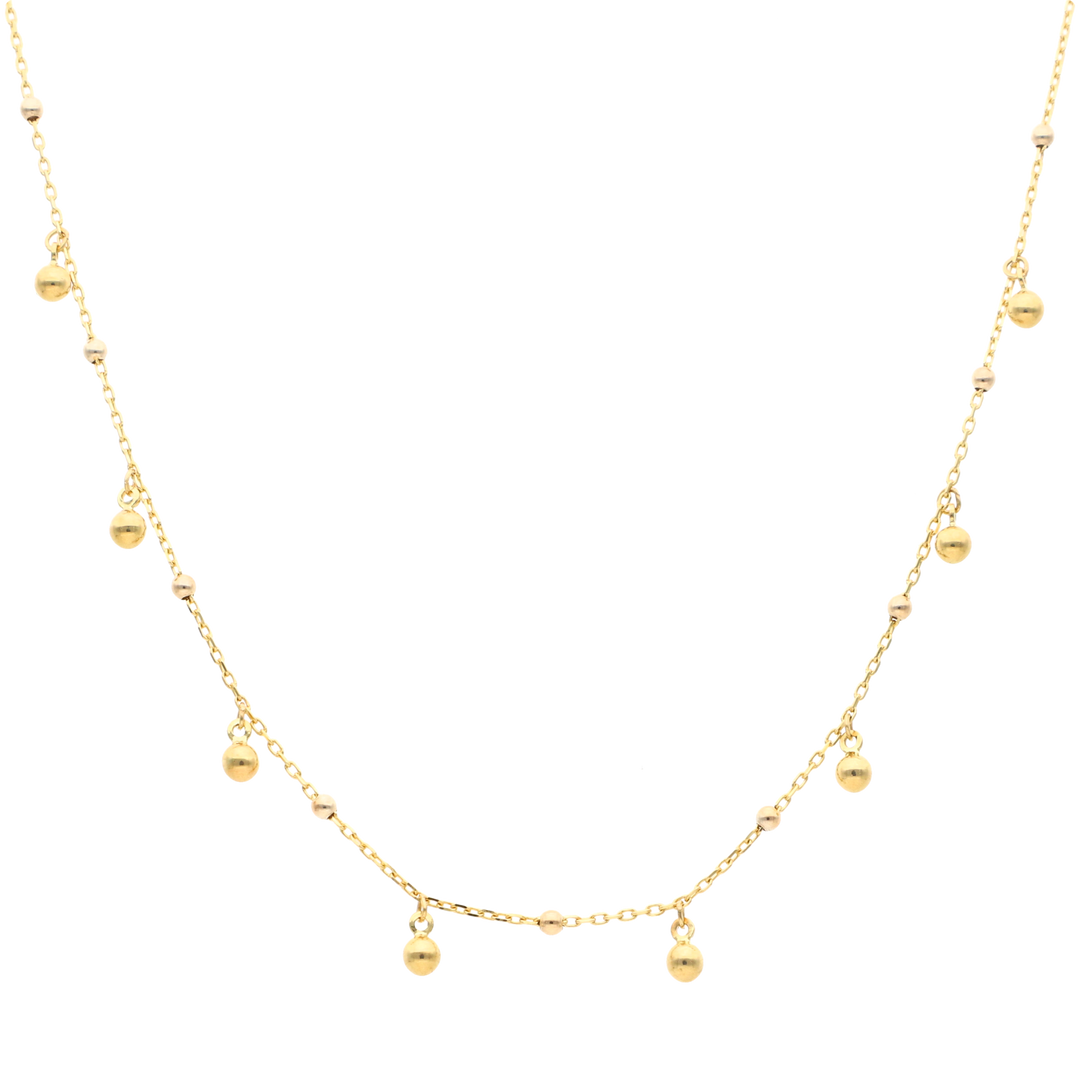 Collar bolitas lisas colgantes 10K