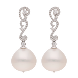 Aretes largos oro blanco 18K brillantes y calabazo 16 mm