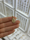 Medalla oval busto Guadalupe bisel liso 14K