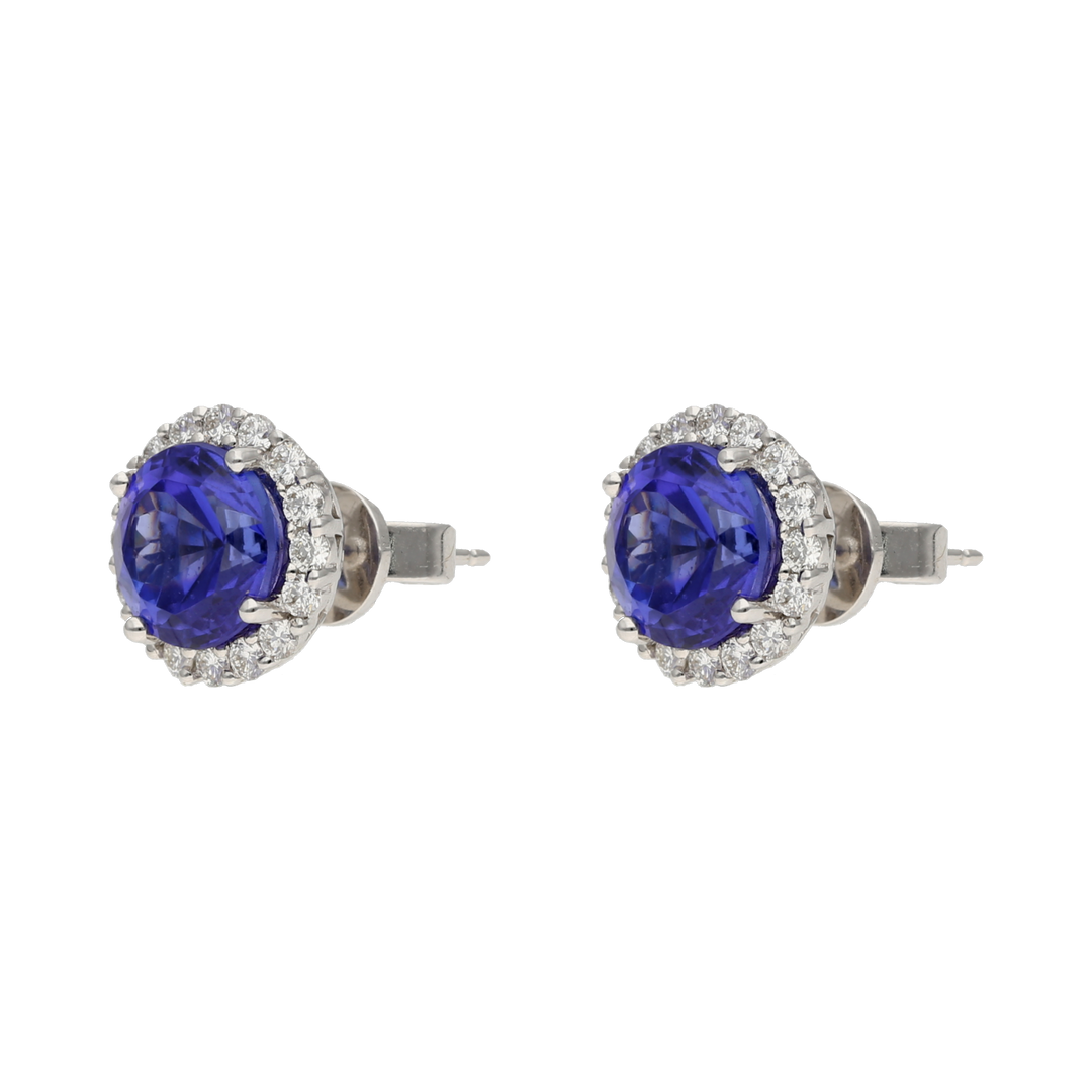 Broquel tanzanitas y brillantes 14K