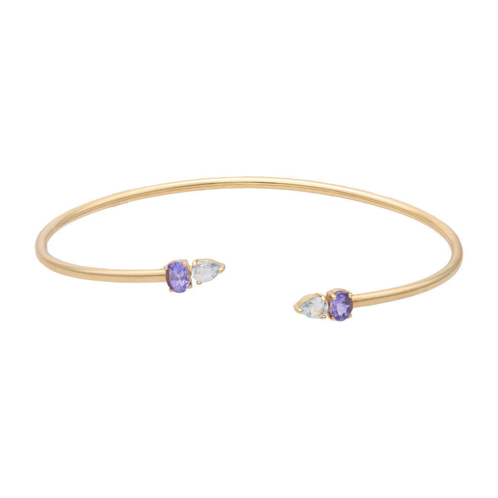 Aro flexible aguamarinas y tanzanitas 14K