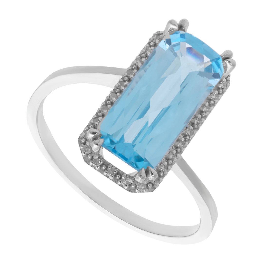 Anillo topacio azul largo brillantes 14K