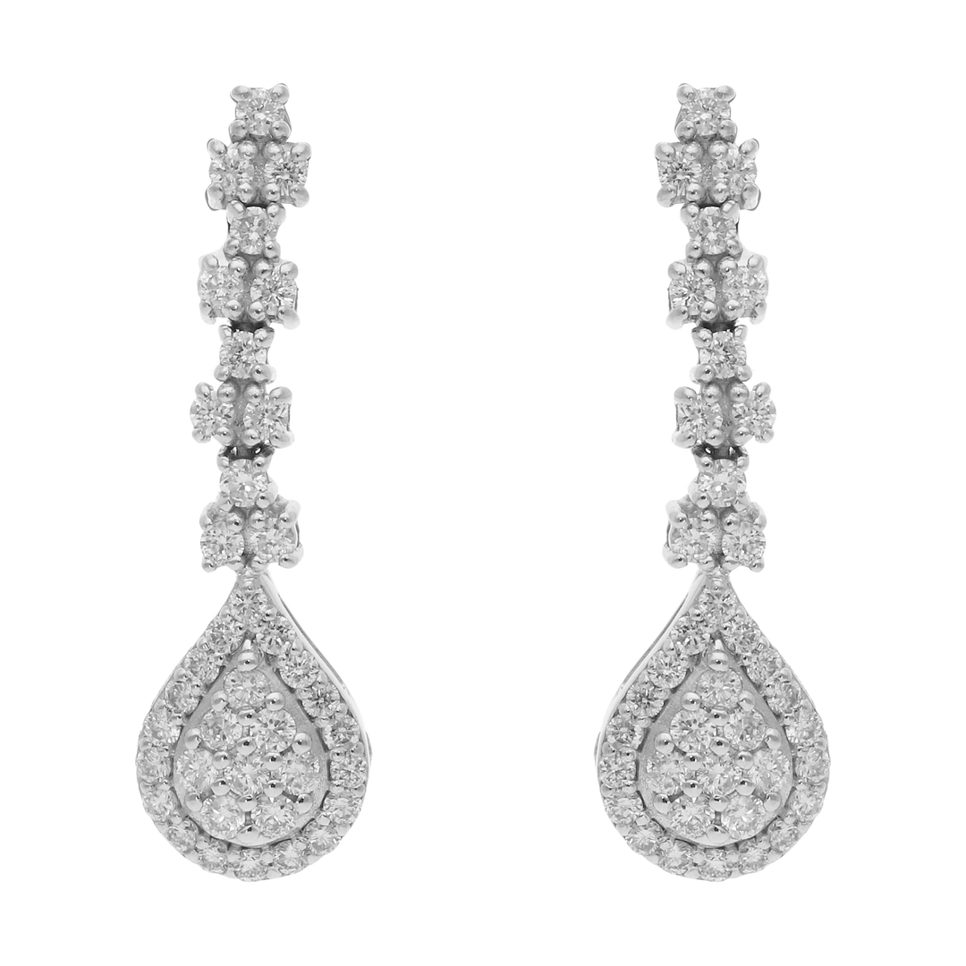 Aretes largos brillantes oro blanco 14K