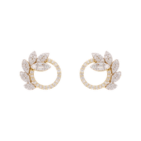 Broquel círculo 6 hojas brillantes 14K