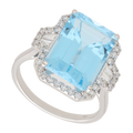 Anillo topacio azul y diamantes oro blanco 14K