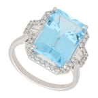 Anillo topacio azul y diamantes oro blanco 14K