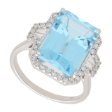 Anillo topacio azul y diamantes oro blanco 14K