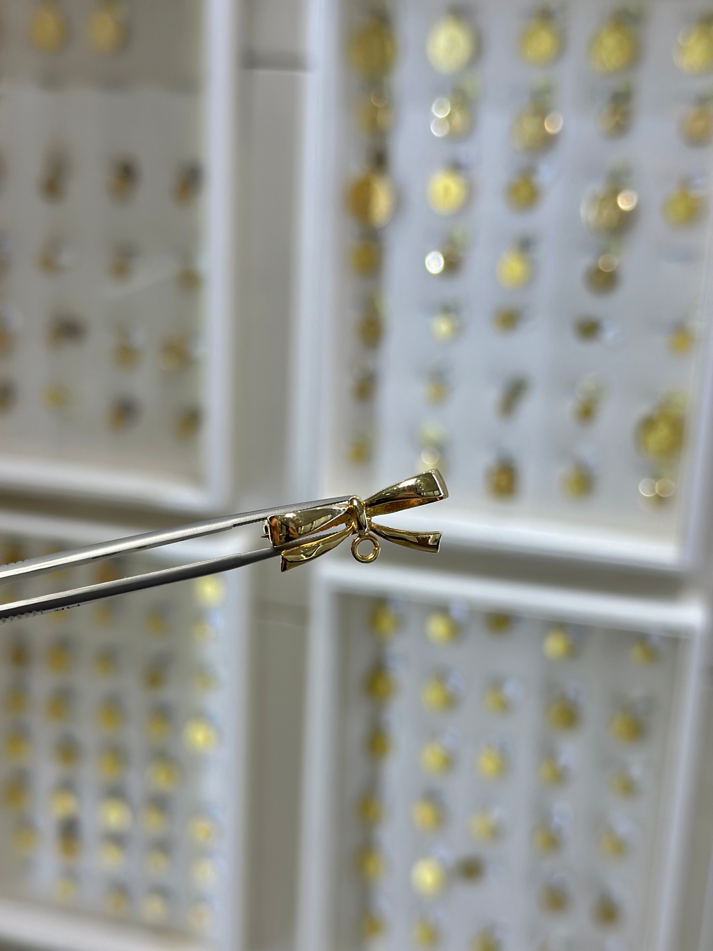 Moño oro amarillo 14K