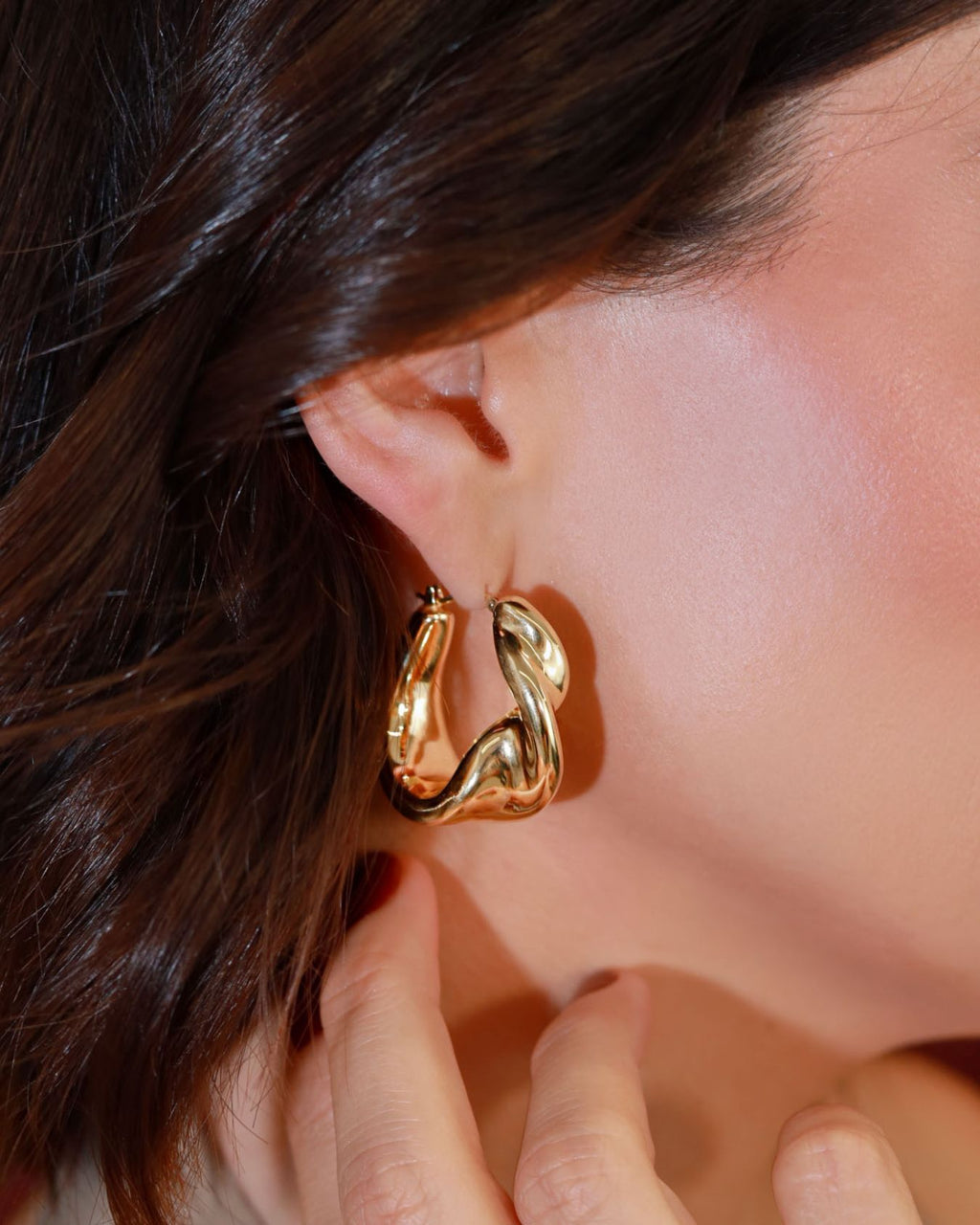 Arracadas huecas chuecas 14K
