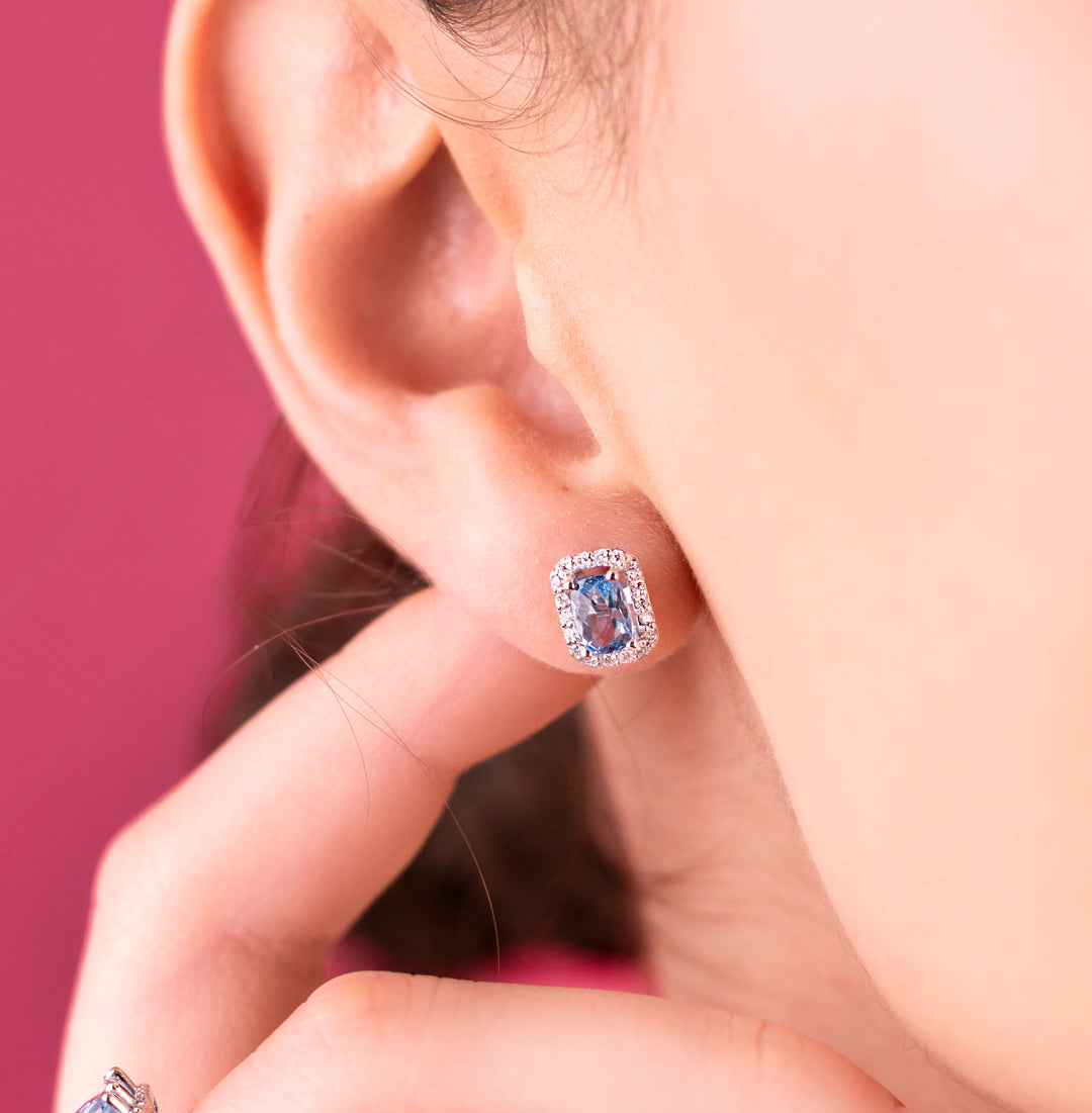 Broquel topacio azul y brillantes 14K