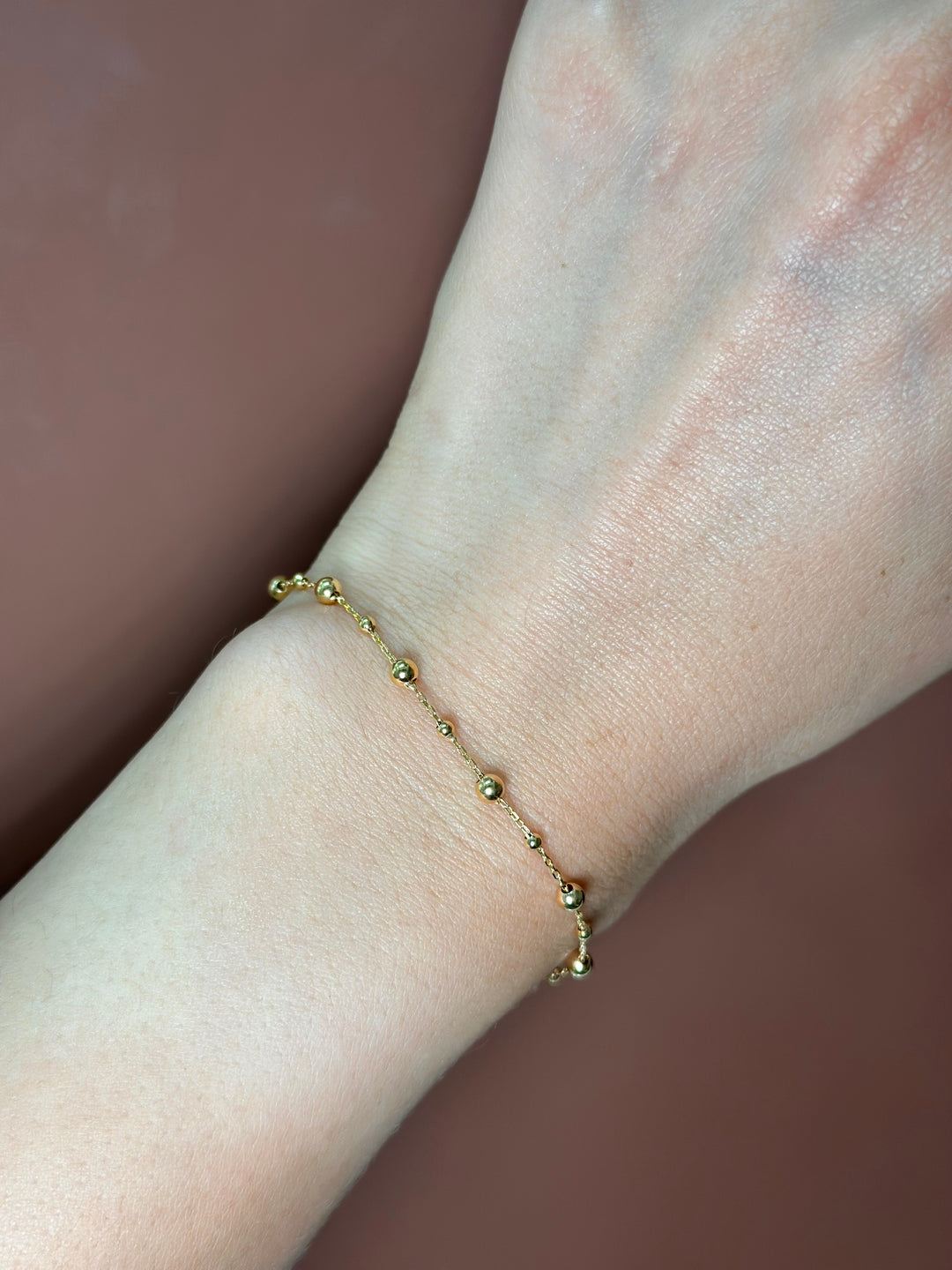 Pulsera bolitas lisas 14K