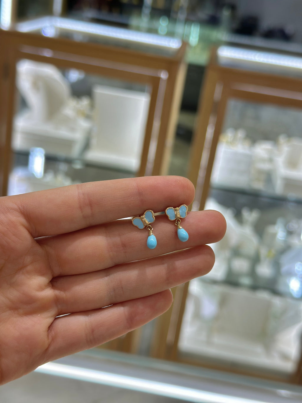 Aretes largos mariposa turquesa 14K