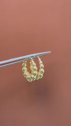 Arracadas bolas huecas 14K