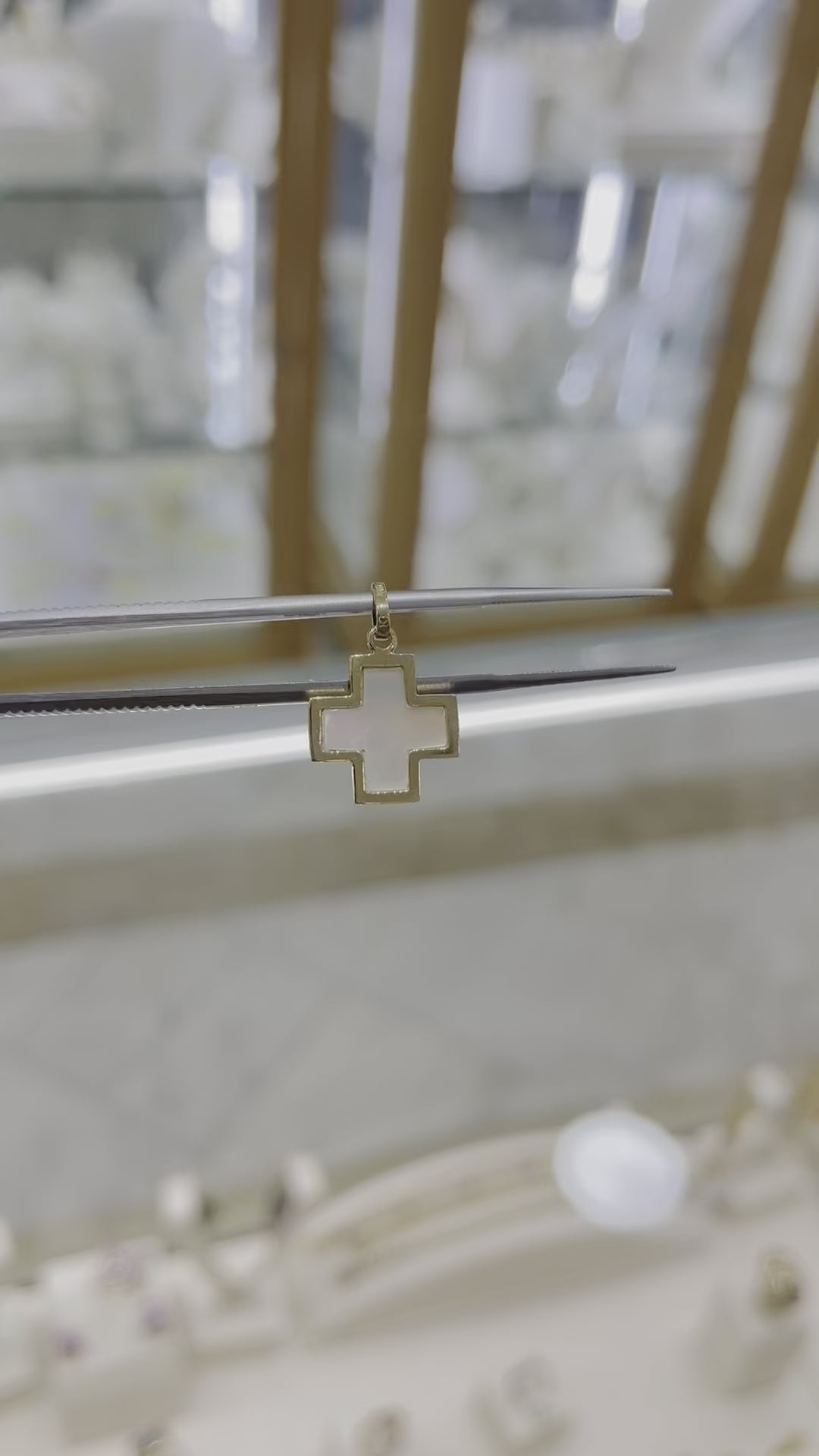 Cruz madre perla 14K