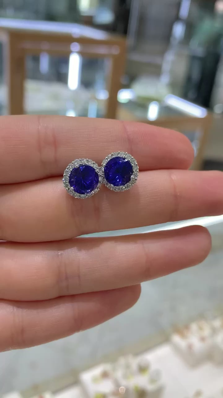 Broquel tanzanitas y brillantes 14K