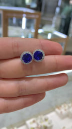 Broquel tanzanitas y brillantes 14K