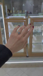 Anillo topacio azul oro blanco 14K