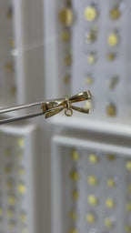 Moño oro amarillo 14K