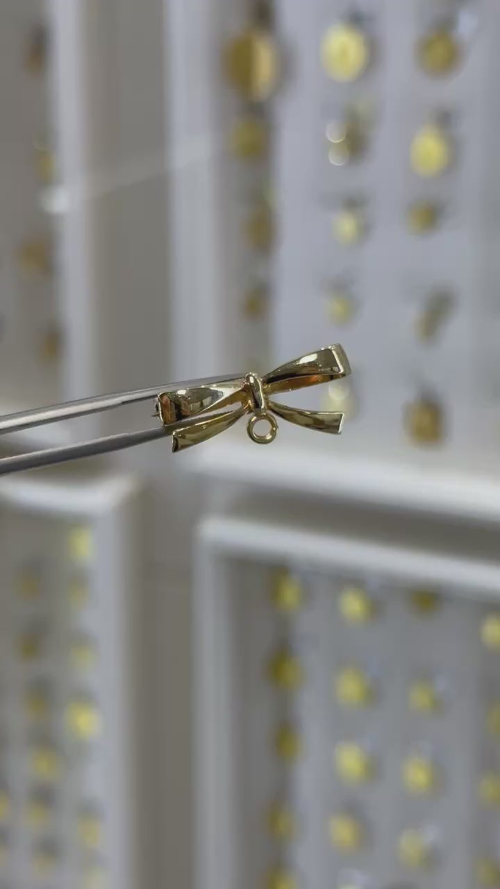 Moño oro amarillo 14K