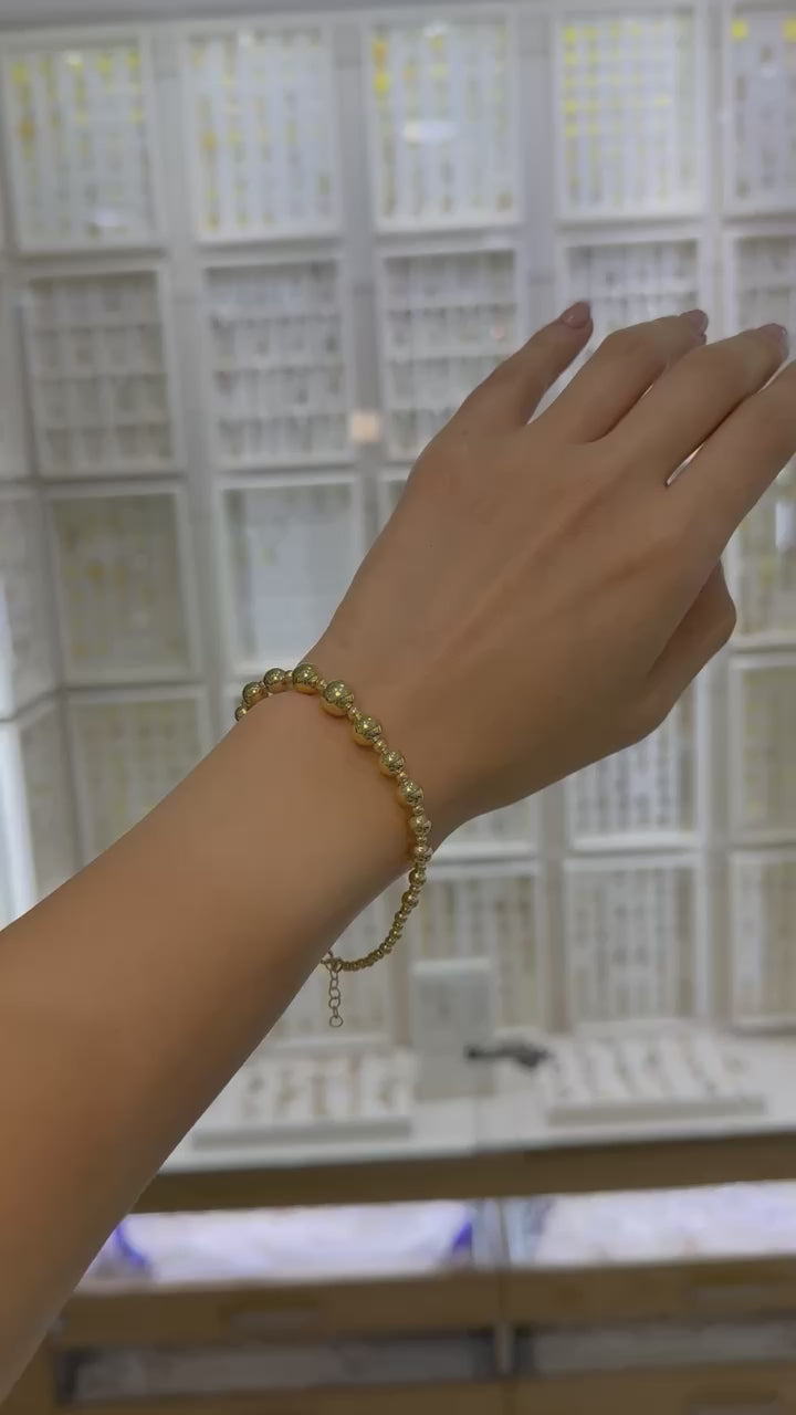 Pulsera bolas huecas 14K