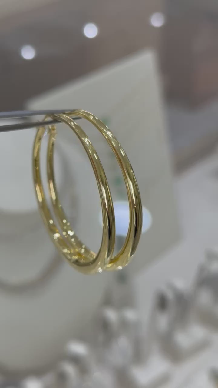 Arracadas circulares grandes huecas 14K