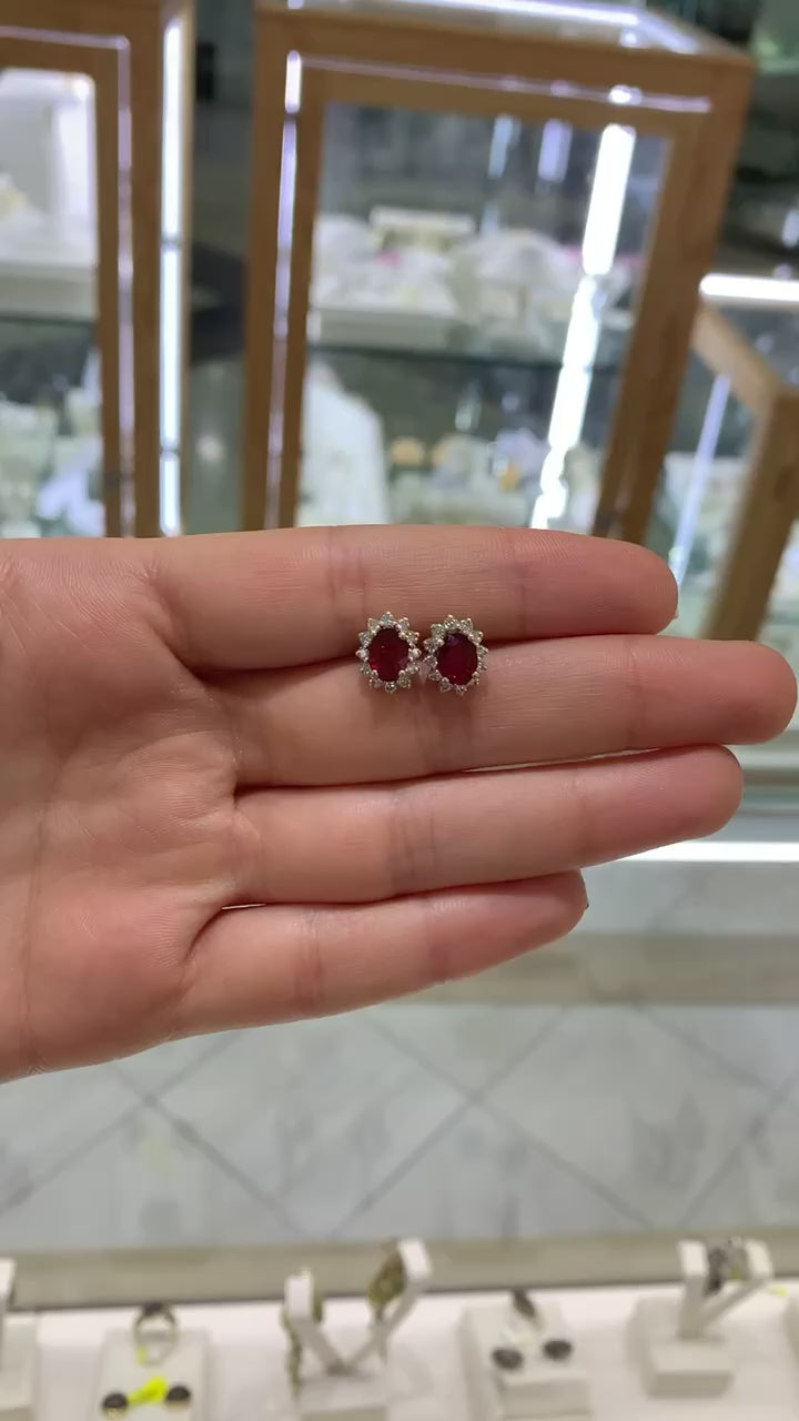 Broquel rubí y brillantes 14K