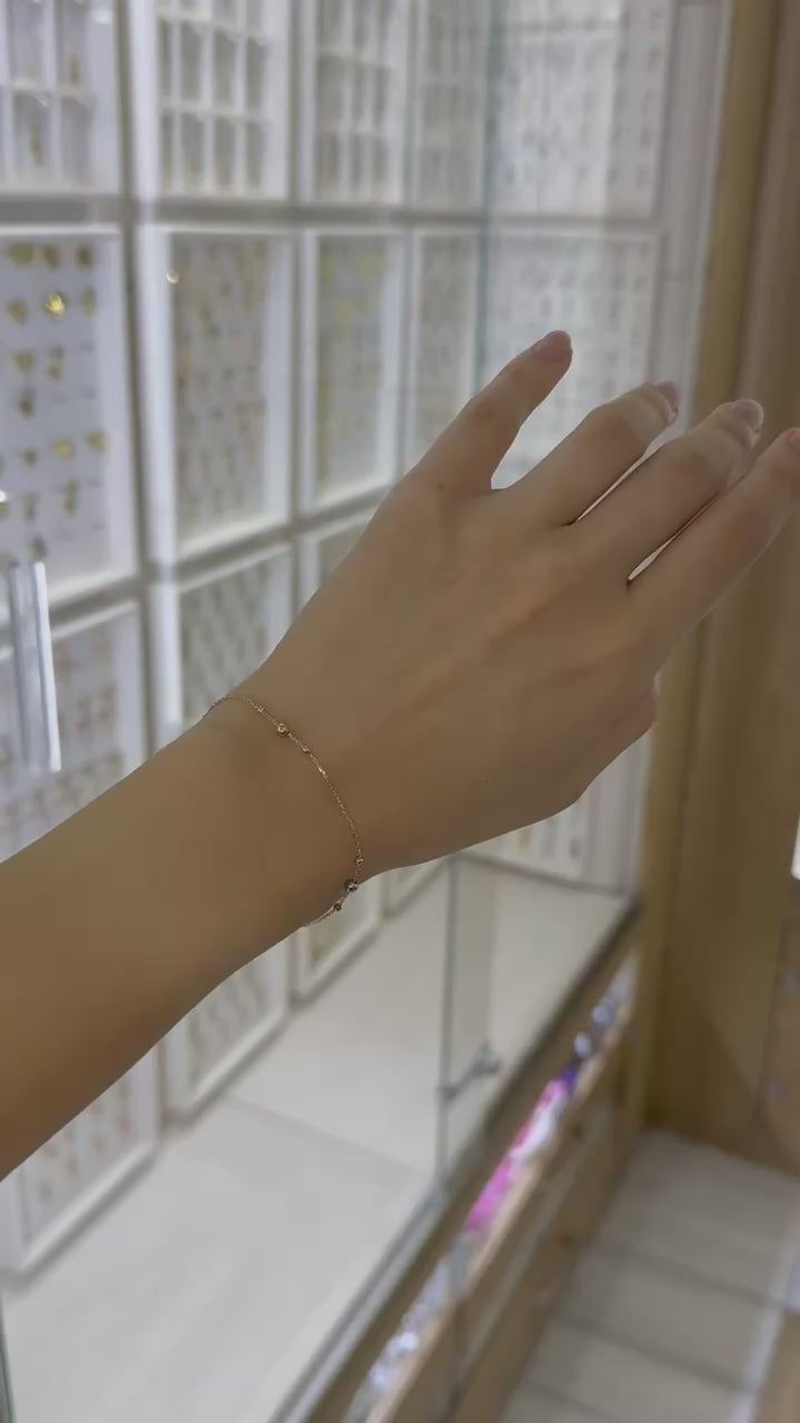 Pulsera bolitas fiorentino 14K