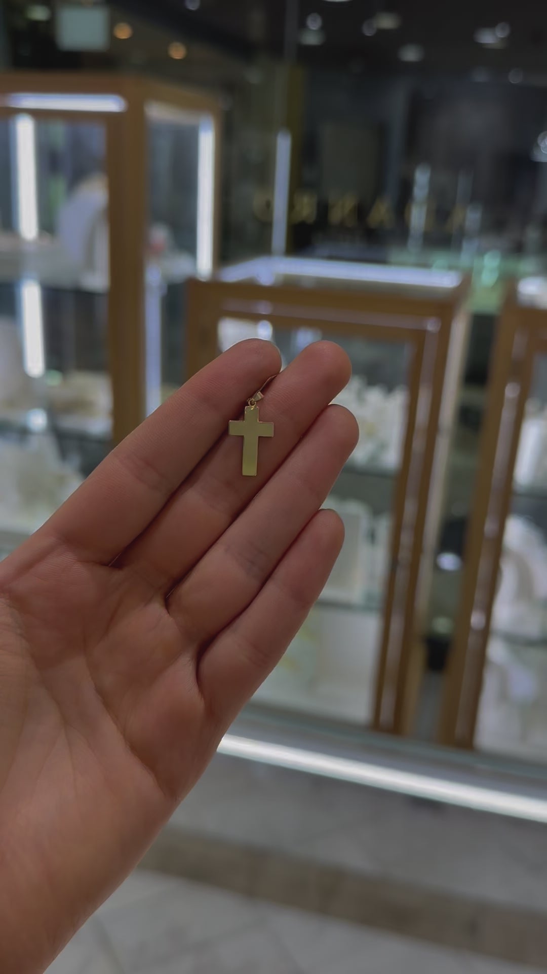 Cruz ligera lisa 14K