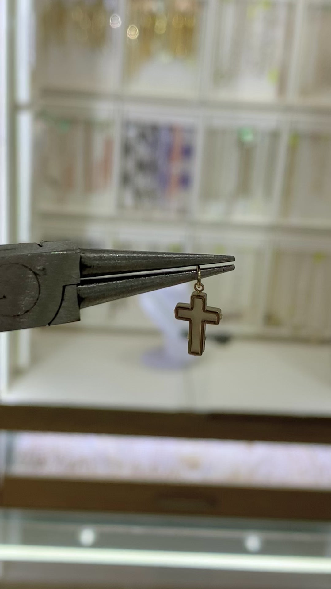 Cruz madre perla 14K