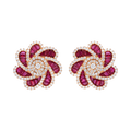 Aretes grandes flores rubíes y diamantes 18K